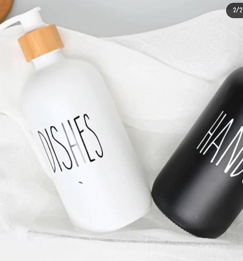 Ceramic dishes/hands soap dispenser with wooden tray. image