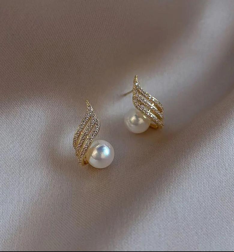 Pearls and crystals on gold image