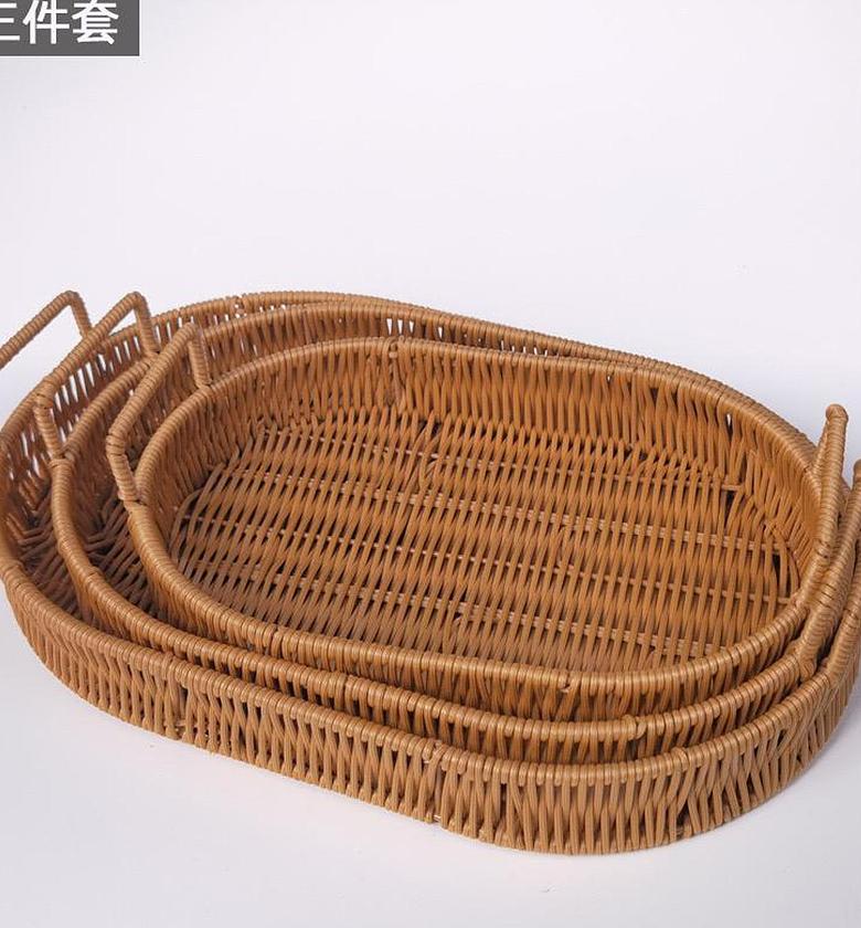RATTAN BASKET. Hand Woven Rattan Fruit Baskets Oval Fruit Bowl image