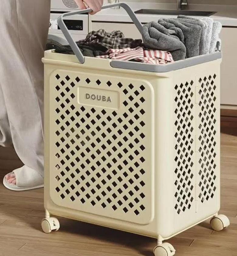 Foldable laundry basket with wheels. image