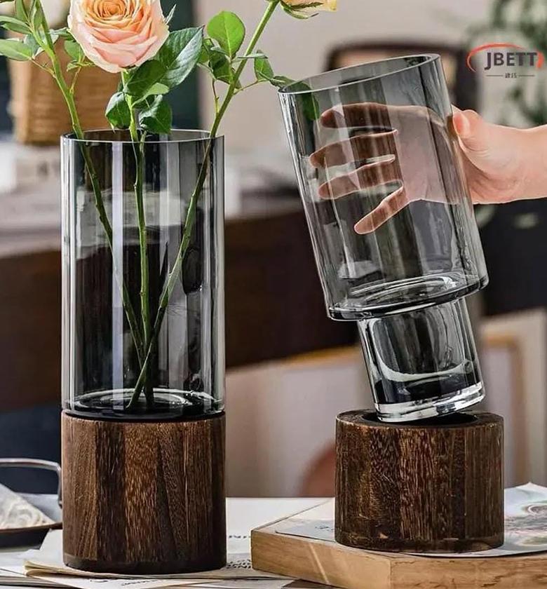 Modern creative glass vase with wooden base image