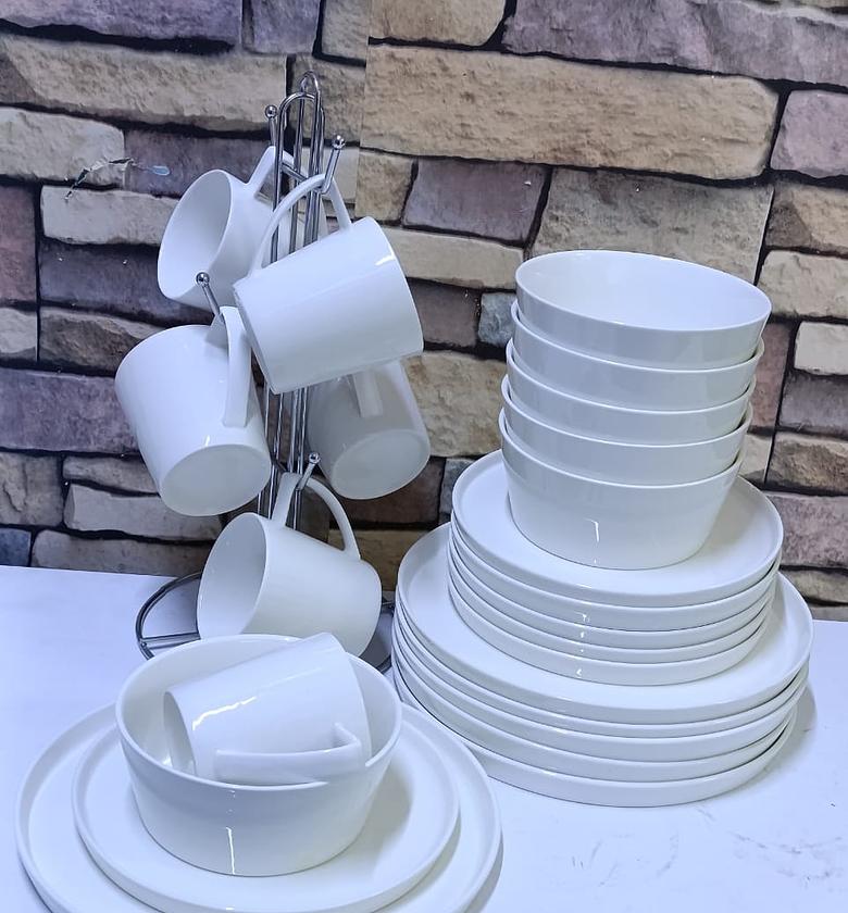 24 pc  White round dinner set. image
