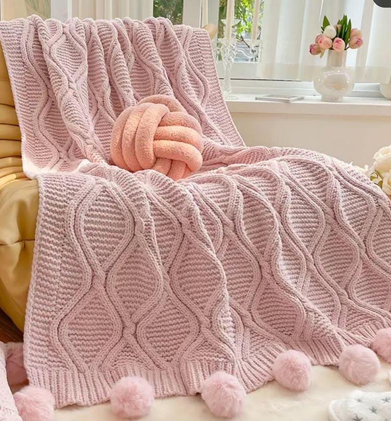 Cozy knitted throw blankets. image