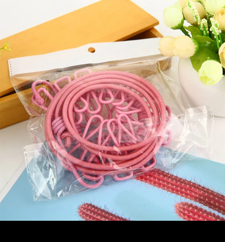 Stretching Clothes line with hooks image