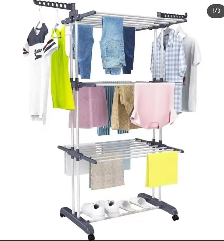 indoor/ outdoor clothes drying rack. image