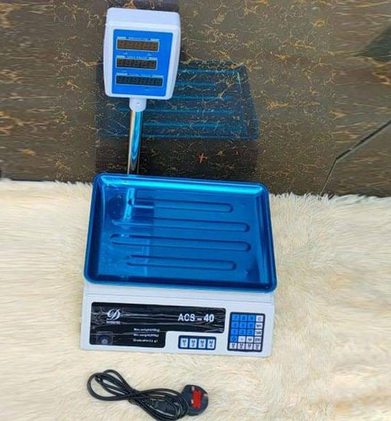 WEIGHING SCALE. 40 kgs digital computing weighing scale with arm image