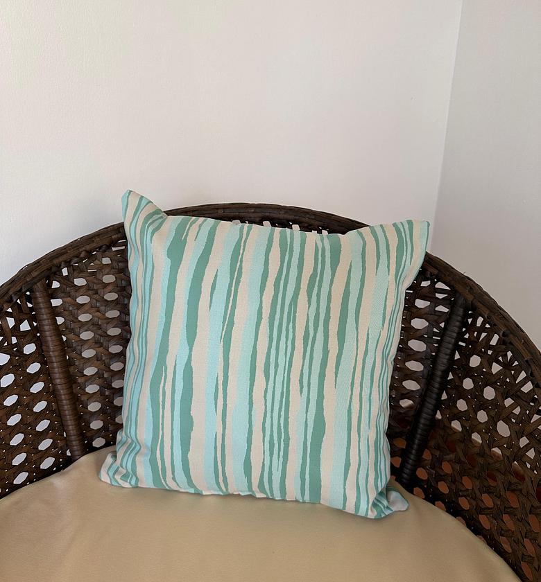 Multi-colored outdoor cushion cover. image