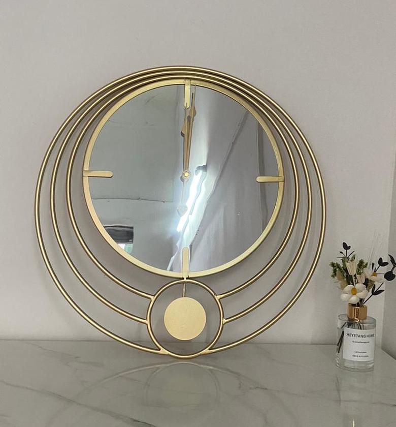 gold decorative wall clock. size 45*45cms  image
