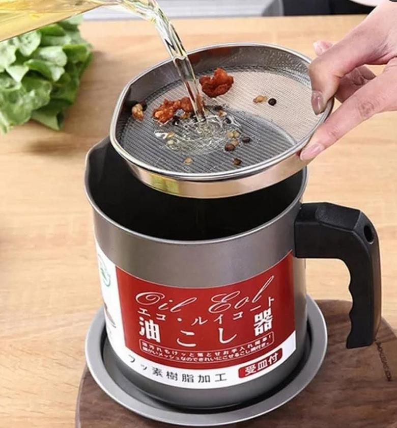 Stainless steel oil filter pot. image