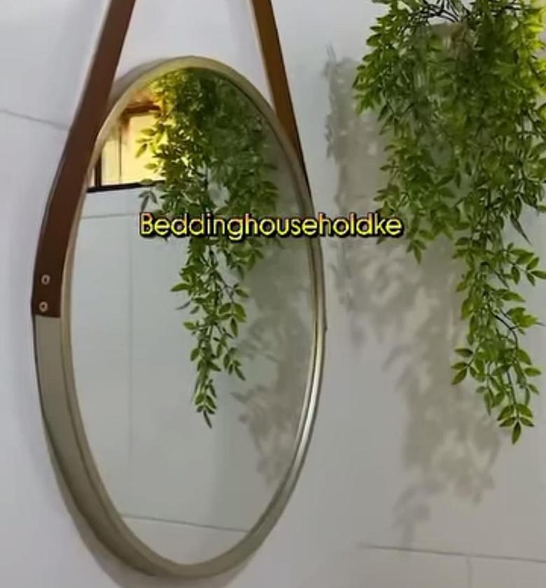 Minimalist Nordic Round Decorative Mirror With A Leather Strap. image