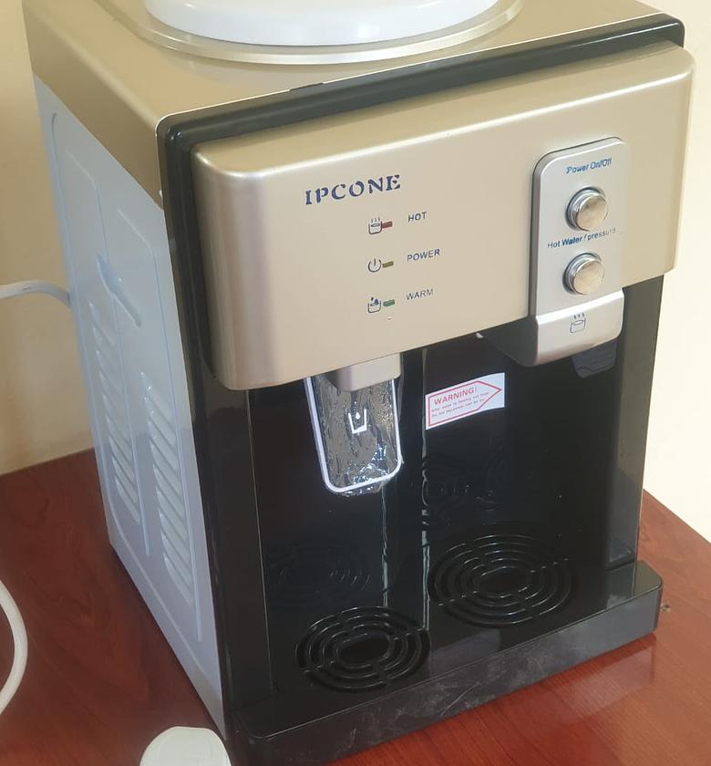 WATER DISPENSER. Ipcone table top water dispenser image