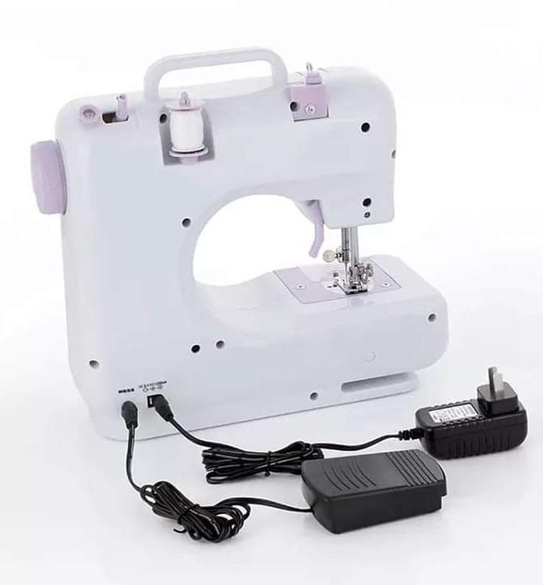 SEWING MACHINE. Household sewing machine image