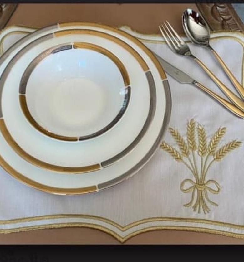 White and gold embloided placement image