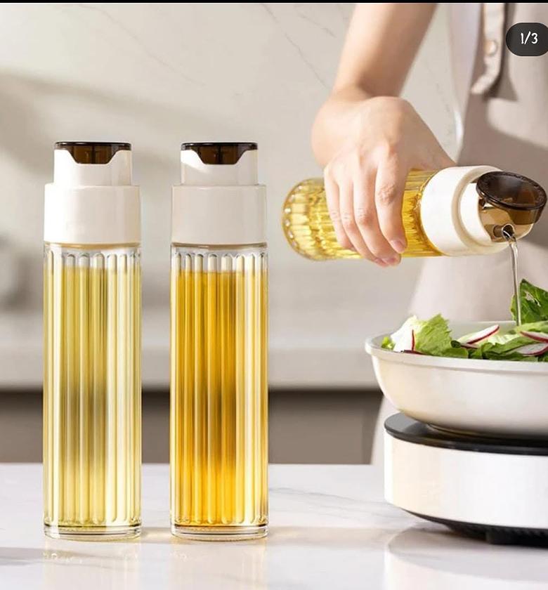 Glass oil dispenser. image