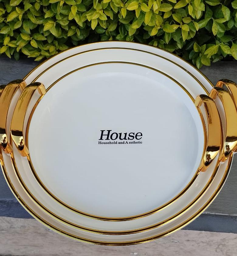 SERVING TRAYS. 3 pcs serving trays with gold crystals handle image