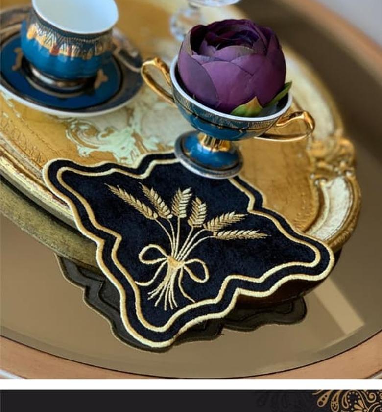 Black and gold embroided linen coaster image