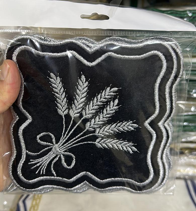 Silver and black embroided linen coaster image