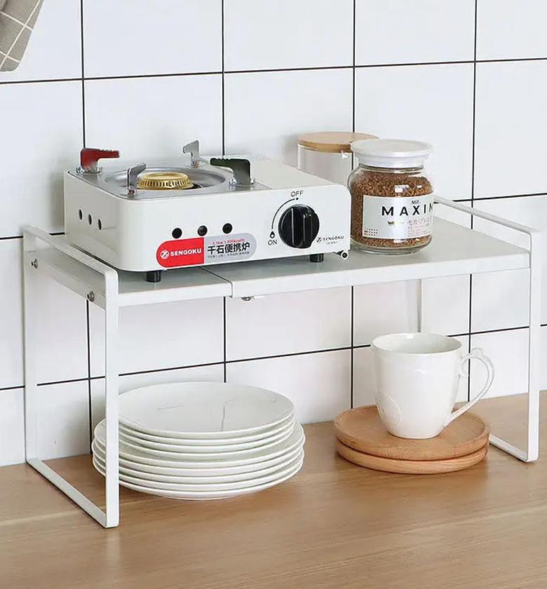 Retractable cabinet storage under shelf rack  image