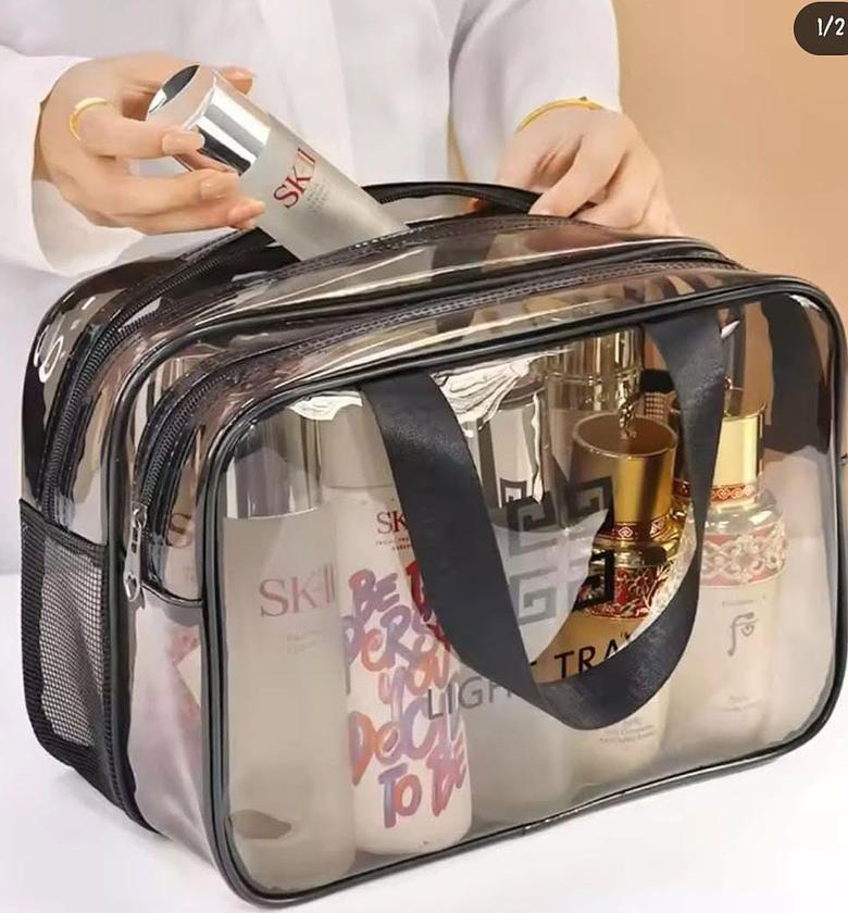 Double compartment, water proof cosmetic bag. image