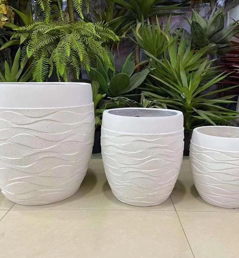 Inspirational concrete creative design flower pots /planter. image
