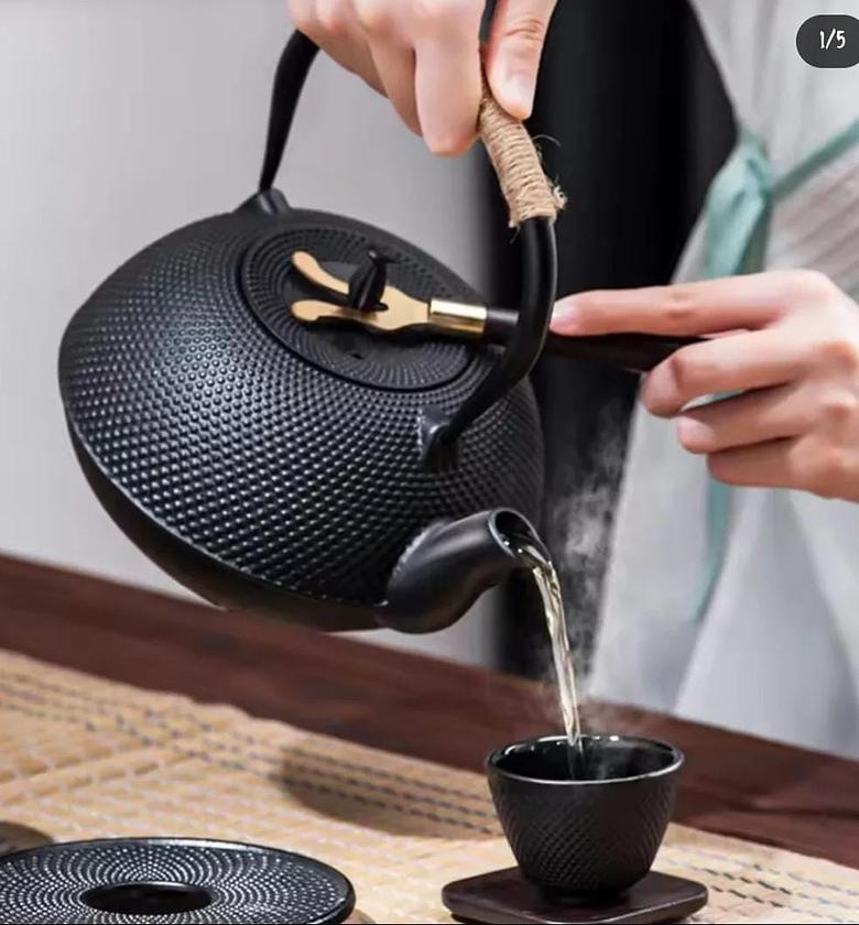 Original heavy duty cast iron tea pot with infuser, cast iron coaster and spoon image