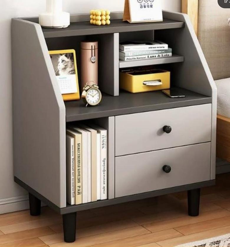 Wooden bedside table. image