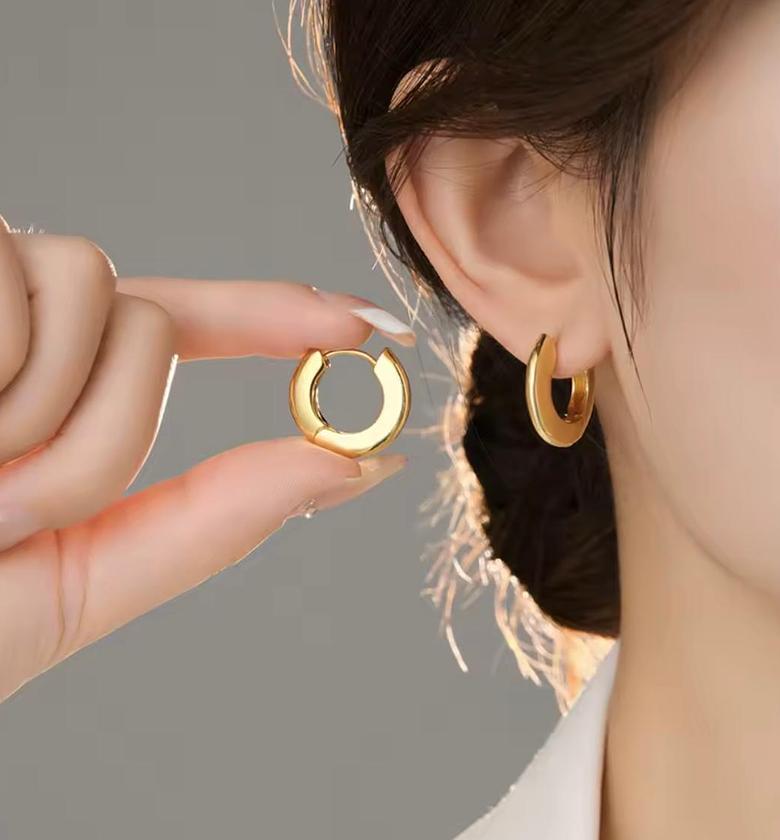 Golden Ribbon Twist Huggie Hoops image