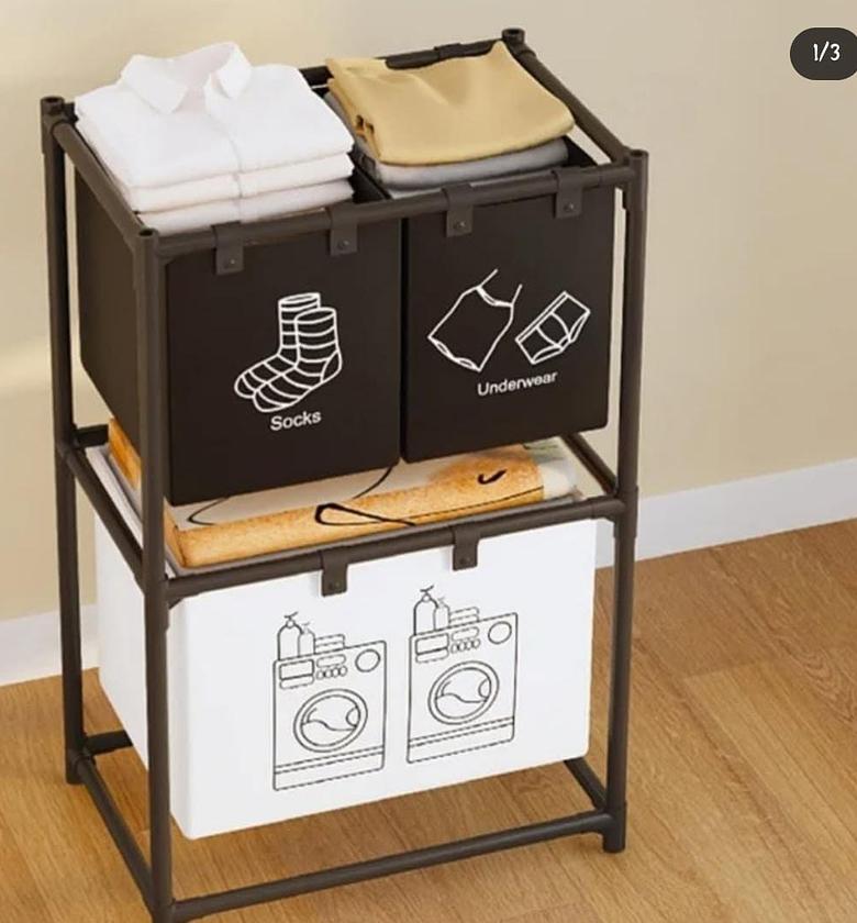 3 slot laundry basket. image