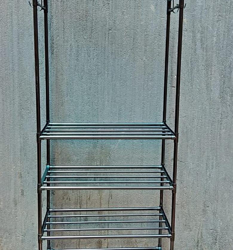 CLOTHES RACK. Double Rods With Wheels  Standing Clothes Rack image