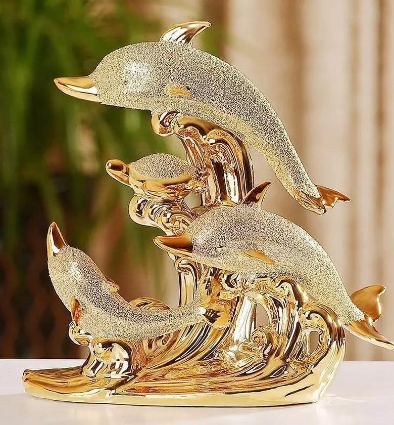 DOLPHIN DECOR. Gold dolphin décor image