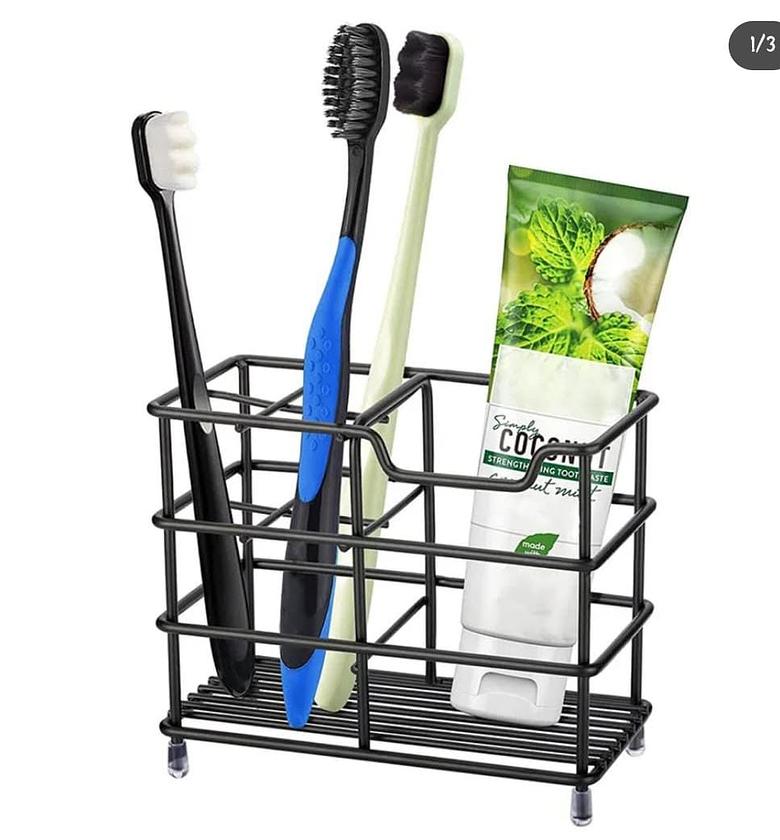 Metallic toothbrush + toothpaste holder image