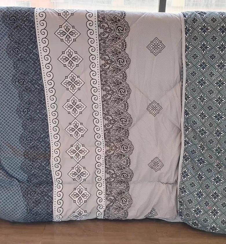 Binded and Double Sided Warm Duvets Comes with 1 bedsheet and 2 pillow cases. image