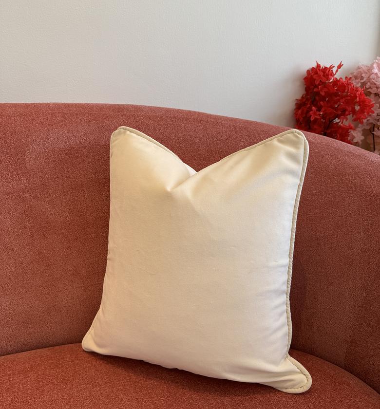 Cream velvet cushion cover. image