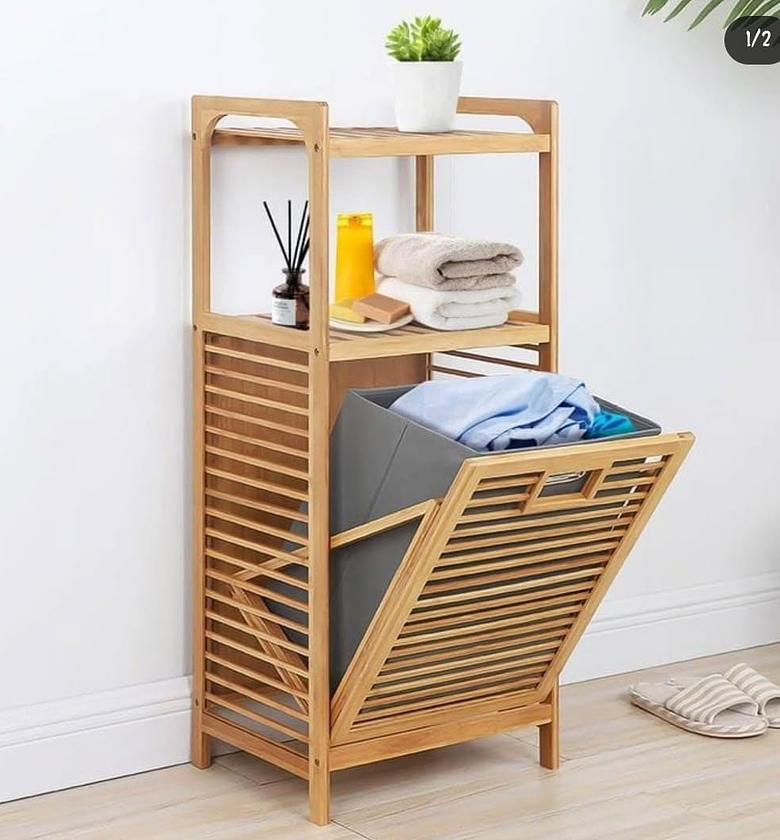 Bamboo laundry hampet with upper storage space. image