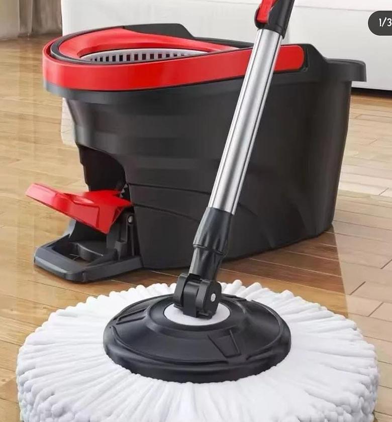 Black spin mop bucket with a foot pedal image
