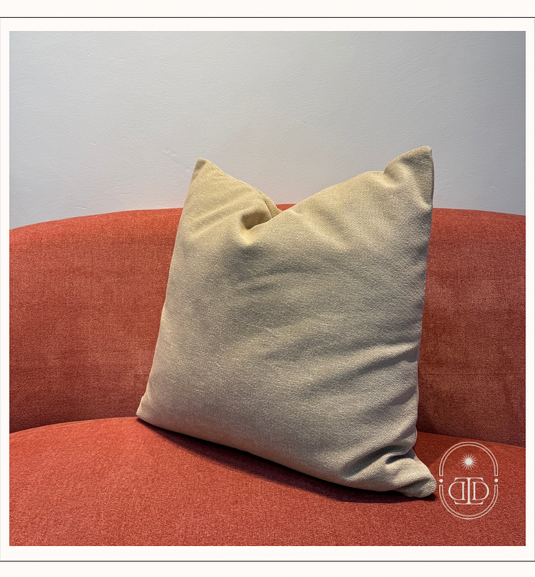 Light brown cushion cover. image