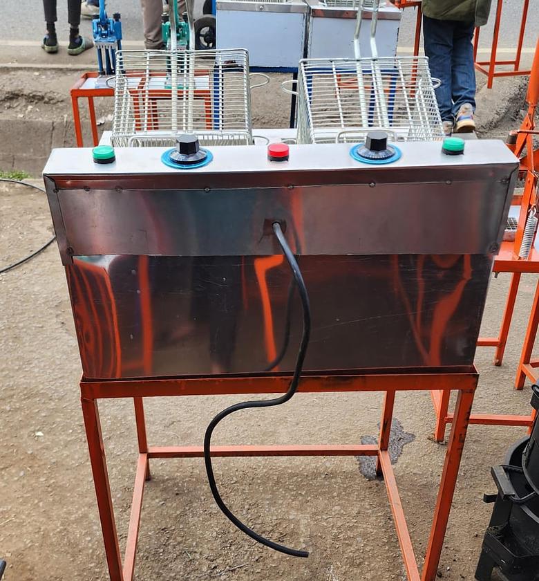 Electric  Double -fryer Jua-kali. Commercial double deep fryer with a stand image